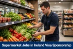 Supermarket Jobs in Ireland male supermarket worker arranging fresh vegetables on a store shelf